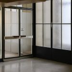 closed gray stainless steel framed glass door